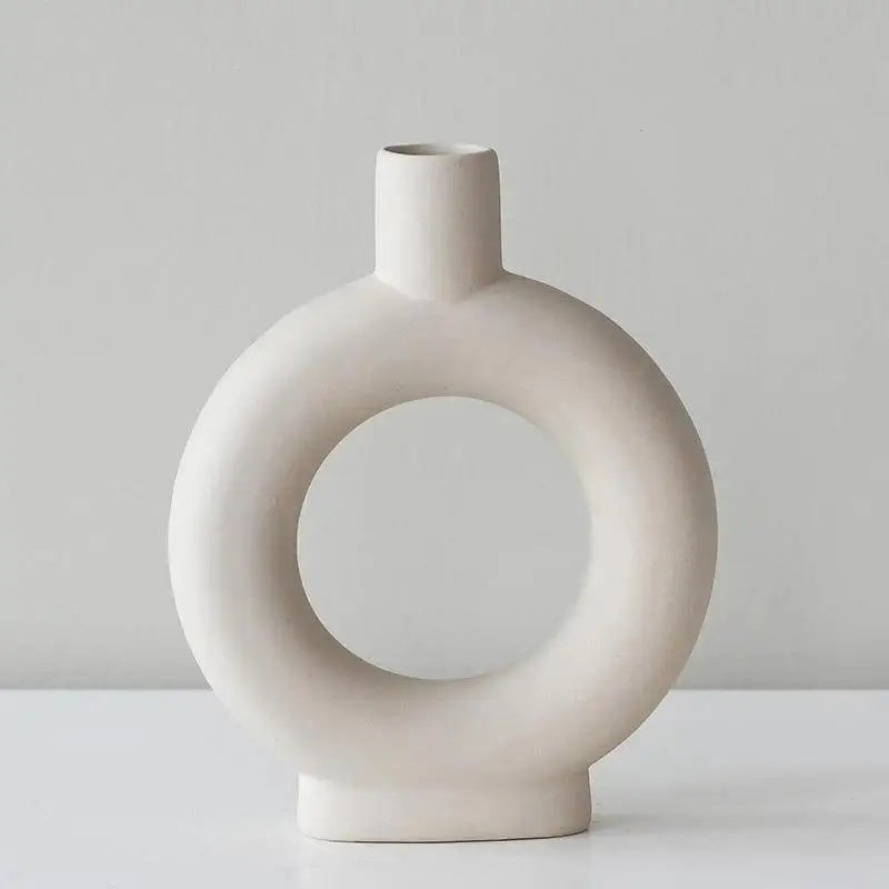 The circular minimalist beautiful ceramic unique handmade vase is perfect for your anniversary family day and Christmas