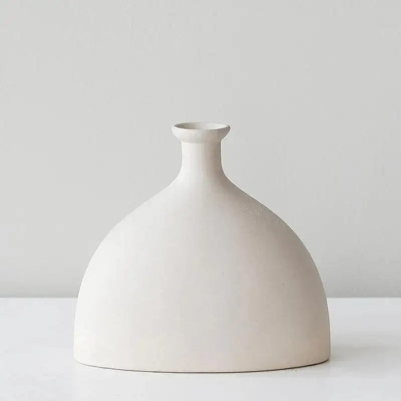 The circular minimalist beautiful ceramic unique handmade vase is perfect for your anniversary family day and Christmas