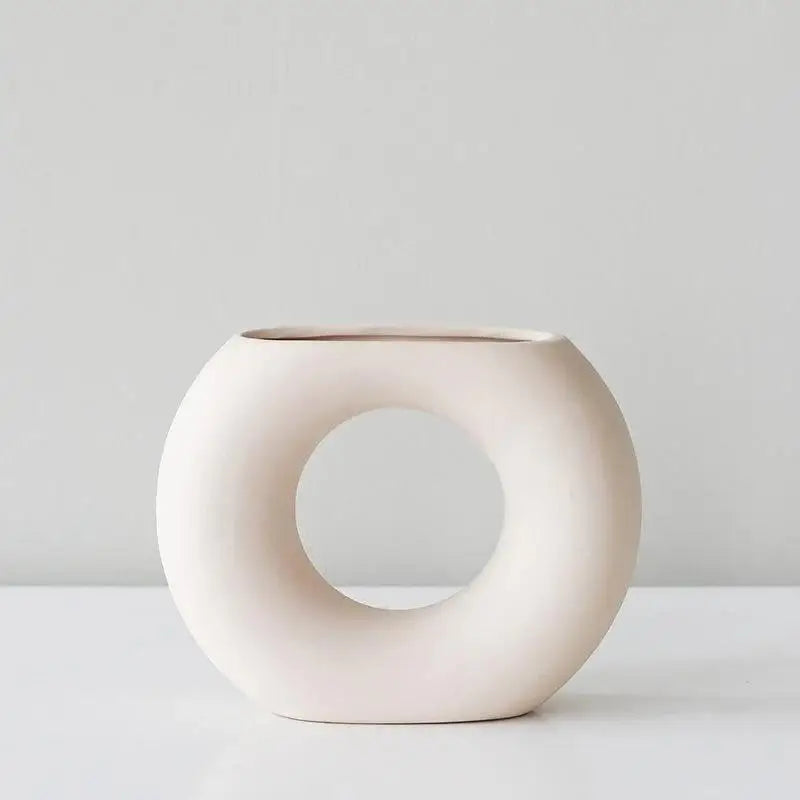 The circular minimalist beautiful ceramic unique handmade vase is perfect for your anniversary family day and Christmas